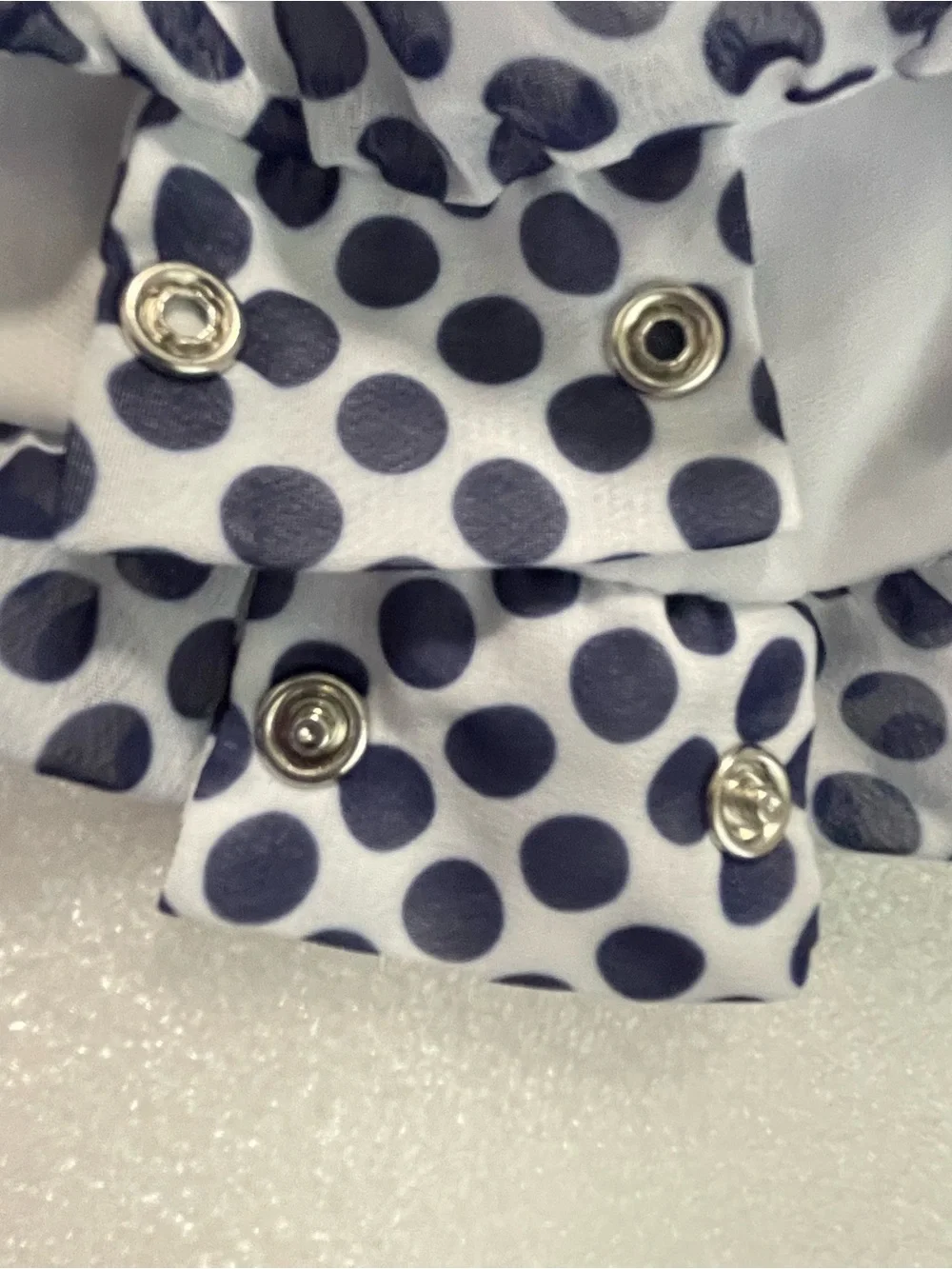 Rare Editions Gray Polka Dot Bib with Red Flower Accent